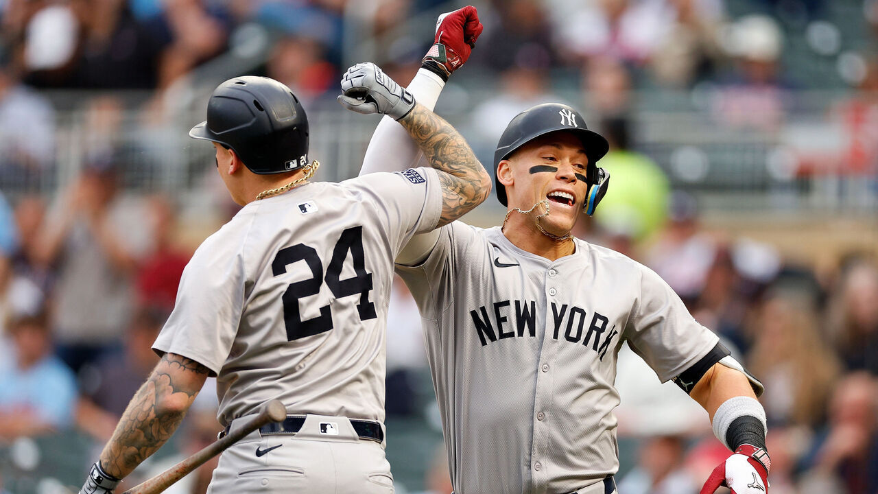 MINNEAPOLIS, MINNESOTA - MAY 15: Aaron Judge #99 of the New York Yankees celebrates his solo home run with teammate Alex Verdugo #24 in the first inning against the Minnesota Twins at Target Field on May 15, 2024 in Minneapolis, Minnesota.