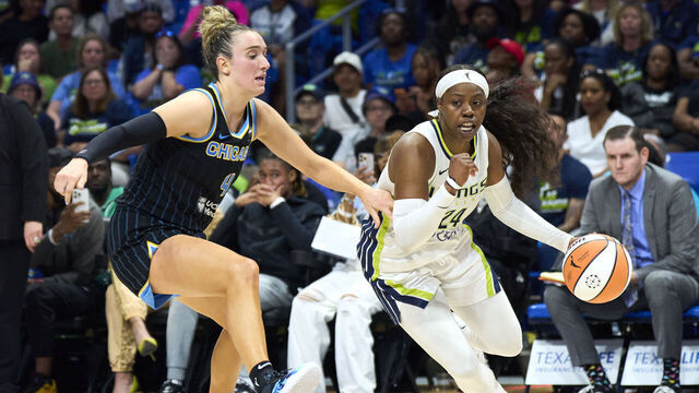 ARLINGTON, TEXAS - MAY 15: Arike Ogunbowale #24 of the Dallas Wings drives to the basket against the Chicago Sky during the second half at the College Park Center on May 15, 2024 in Arlington, Texas.