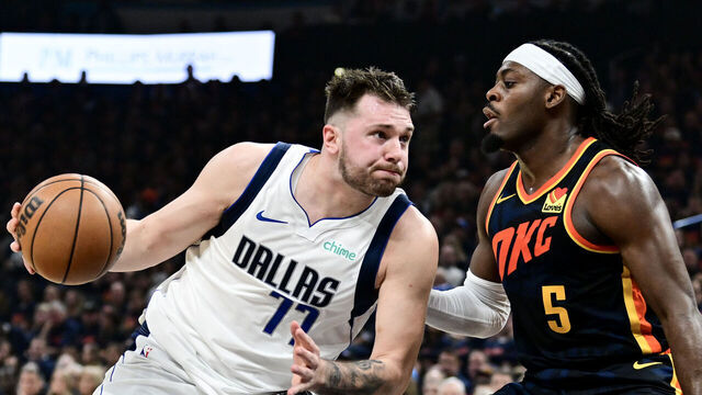 OKLAHOMA CITY, OKLAHOMA - MAY 15: Luka Doncic #77 of the Dallas Mavericks drives to the basket against Luguentz Dort #5 of the Oklahoma City Thunder during the second quarter in Game Five of the Western Conference Second Round Playoffs at Paycom Center on May 15, 2024 in Oklahoma City, Oklahoma.