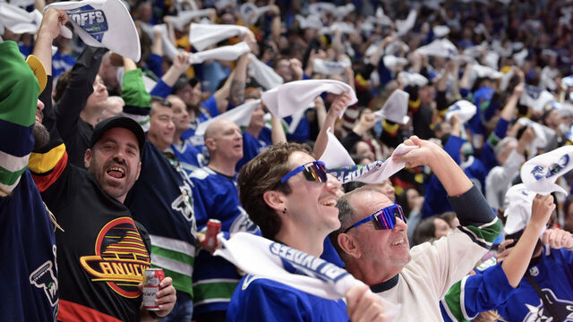 VANCOUVER, BRITISH COLUMBIA - MAY 10: Vancouver Canucks fans cheer during the second period against the Edmonton Oilers in Game Two of the Second Round of the 2024 Stanley Cup Playoffs at Rogers Arena on May 10, 2024 in Vancouver, British Columbia.