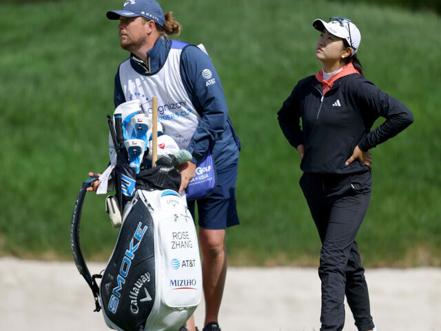 CLIFTON, NEW JERSEY - MAY 12: Rose Zhang of the United States and her caddie looks on from the 13th hole during the final round of the Cognizant Founders Cup at Upper Montclair Country Club on May 12, 2024 in Clifton, New Jersey.