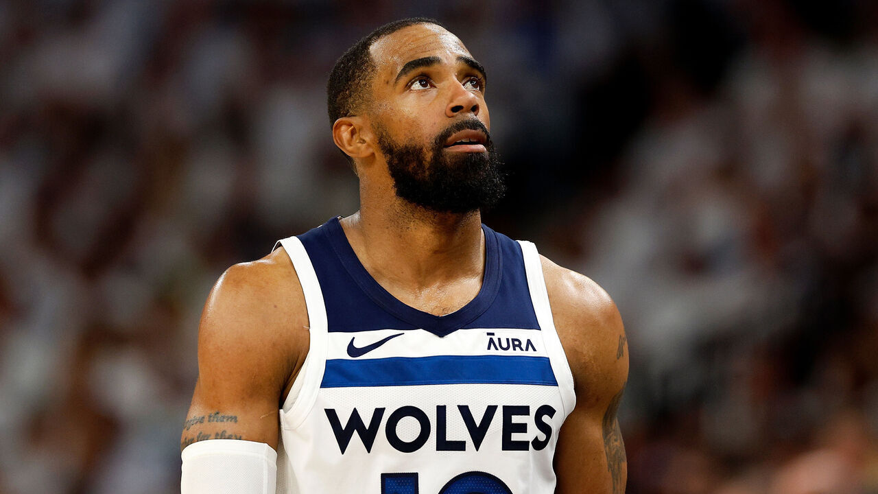 MINNEAPOLIS, MINNESOTA - MAY 12: Mike Conley #10 of the Minnesota Timberwolves looks on against the Denver Nuggets in the second quarter of Game Four of the Western Conference Second Round Playoffs at Target Center on May 12, 2024 in Minneapolis, Minnesota. The Nuggets defeated the Timberwolves 115-107.