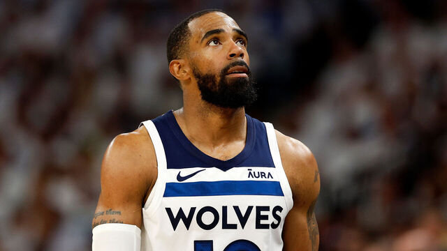 MINNEAPOLIS, MINNESOTA - MAY 12: Mike Conley #10 of the Minnesota Timberwolves looks on against the Denver Nuggets in the second quarter of Game Four of the Western Conference Second Round Playoffs at Target Center on May 12, 2024 in Minneapolis, Minnesota. The Nuggets defeated the Timberwolves 115-107.