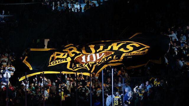 BOSTON, MASSACHUSETTS - MAY 12: A large Boston Bruins 100th anniversary centennial flag makes its way over a group of fans before a game against the Florida Panthers before Game Four of the Second Round of the 2024 Stanley Cup Playoffs at the TD Garden on May 12, 2024 in Boston, Massachusetts. The Panthers won 3-2.