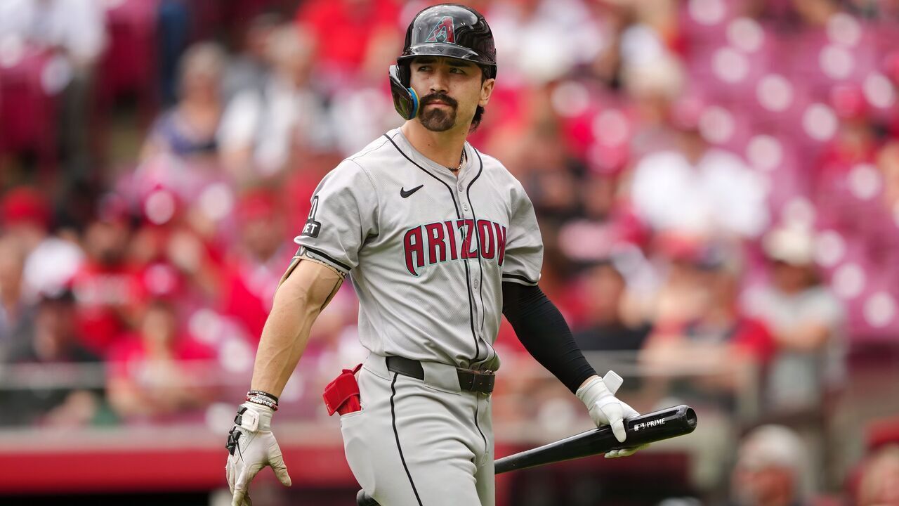 CINCINNATI, OHIO - MAY 09: Corbin Carroll #7 of the Arizona Diamondbacks walks back to the dugout after striking out in the first inning against the Cincinnati Reds at Great American Ball Park on May 09, 2024 in Cincinnati, Ohio.