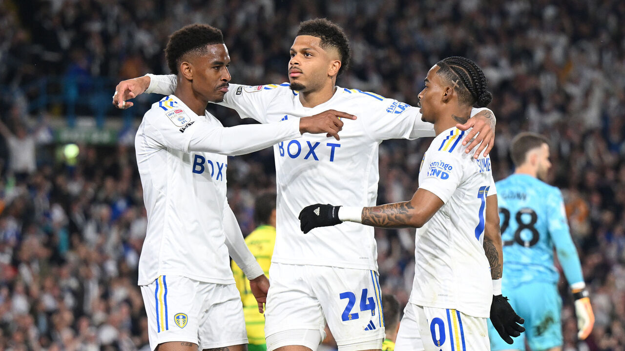 LEEDS, ENGLAND - MAY 16: Crysencio Summerville of Leeds United celebrates scoring his team's fourth goal with teammates Junior Firpo and Georginio Rutter of Leeds United during the Sky Bet Championship Play-Off Semi-Final 2nd Leg match between Leeds United and Norwich City at Elland Road on May 16, 2024 in Leeds, England.