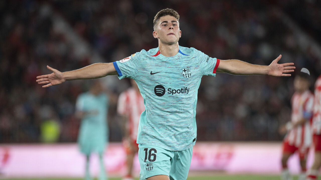 Barcelona's Spanish midfielder #16 Fermin Lopez celebrates scoring his second goal during the Spanish league football match between UD Almeria and FC Barcelona at the Municipal Stadium of the Mediterranean Games in Almeria on May 16, 2024.