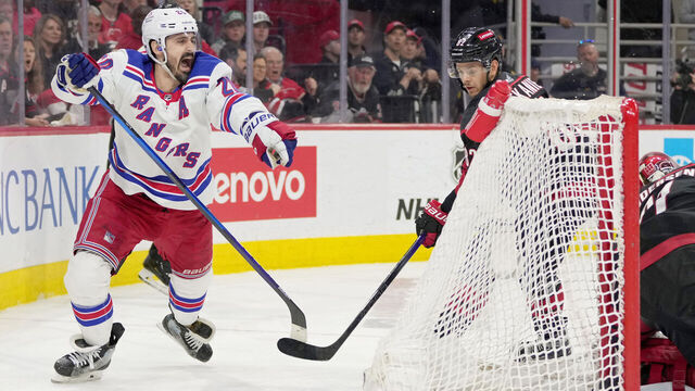 RALEIGH, NORTH CAROLINA - MAY 16: Chris Kreider #20 of the New York Rangers celebrates a goal against the Carolina Hurricanes during the third period in Game Six of the Second Round of the 2024 Stanley Cup Playoffs at PNC Arena on May 16, 2024 in Raleigh, North Carolina.