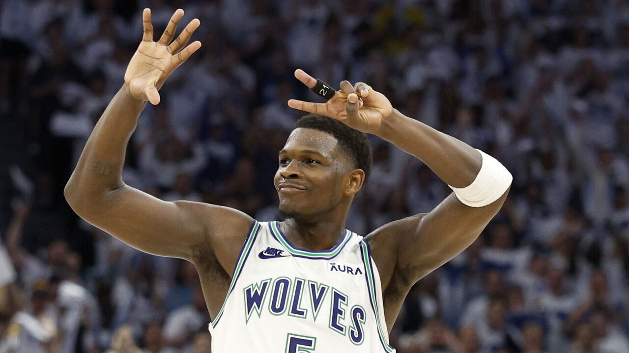 MINNEAPOLIS, MINNESOTA - MAY 16: Anthony Edwards #5 of the Minnesota Timberwolves celebrates against the Denver Nuggets during the fourth quarter in Game Six of the Western Conference Second Round Playoffs at Target Center on May 16, 2024 in Minneapolis, Minnesota.