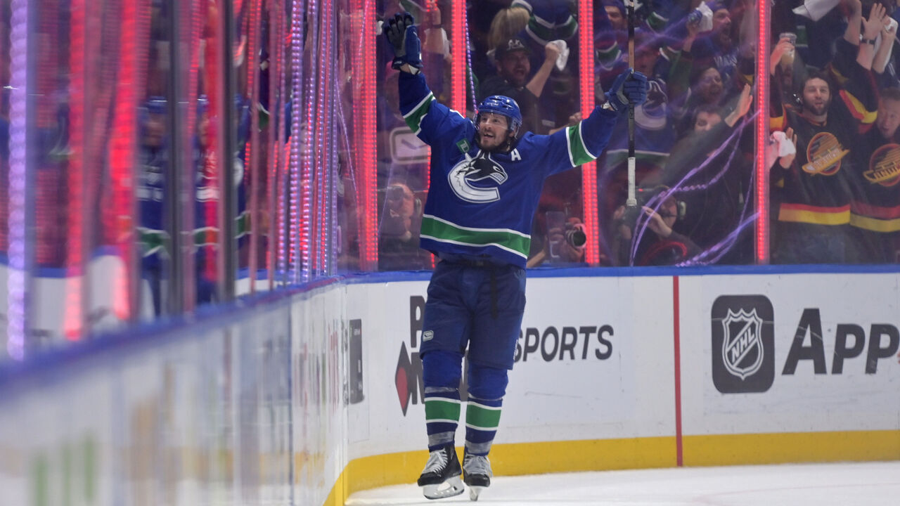 VANCOUVER, BRITISH COLUMBIA - MAY 16: J.T. Miller #9 of the Vancouver Canucks celebrates the game-winning goal Edmonton Oilers during the third period in Game Five of the Second Round of the 2024 Stanley Cup Playoffs at Rogers Arena on May 16, 2024, in Vancouver, British Columbia.