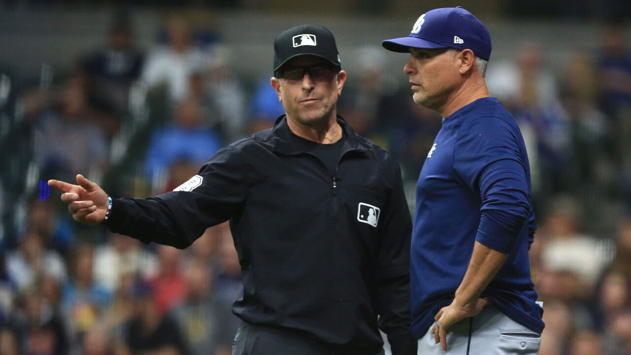 MILWAUKEE, WI - APRIL 29: Crew chief umpire Chris Guccione (68) explains a call to Tampa Bay Rays manager Kevin Cash (16) during a game between the Milwaukee Brewers and the Tampa Bay Rays at American Family Field on April 29, 2024 in Milwaukee, WI.