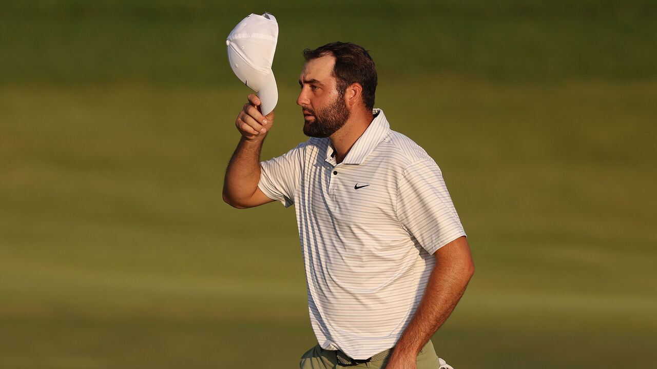 LOUISVILLE, KENTUCKY - MAY 16: Scottie Scheffler of the United States reacts to the crowd on the 18th green during the first round of the 2024 PGA Championship at Valhalla Golf Club on May 16, 2024 in Louisville, Kentucky.