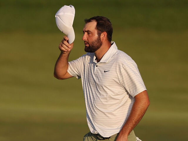 LOUISVILLE, KENTUCKY - MAY 16: Scottie Scheffler of the United States reacts to the crowd on the 18th green during the first round of the 2024 PGA Championship at Valhalla Golf Club on May 16, 2024 in Louisville, Kentucky.