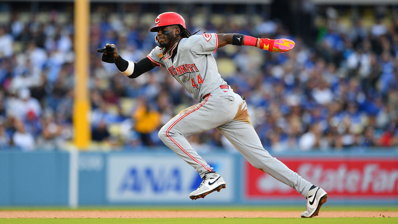 LOS ANGELES, CA - MAY 16: Cincinnati Reds shortstop Elly De La Cruz (44) attempts to steal third base during the MLB game between the Cincinnati Reds and the Los Angeles Dodgers on May 16, 2024 at Dodger Stadium in Los Angeles, CA.