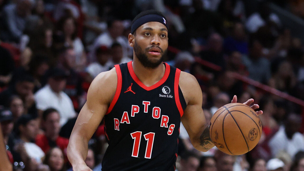 MIAMI, FLORIDA - APRIL 14: Bruce Brown #11 of the Toronto Raptors dribbles the ball against the Miami Heat during the fourth quarter of the game at Kaseya Center on April 14, 2024 in Miami, Florida.