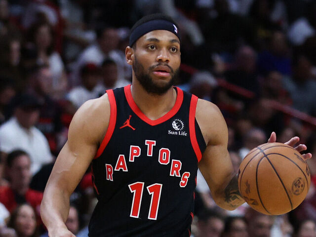 MIAMI, FLORIDA - APRIL 14: Bruce Brown #11 of the Toronto Raptors dribbles the ball against the Miami Heat during the fourth quarter of the game at Kaseya Center on April 14, 2024 in Miami, Florida.