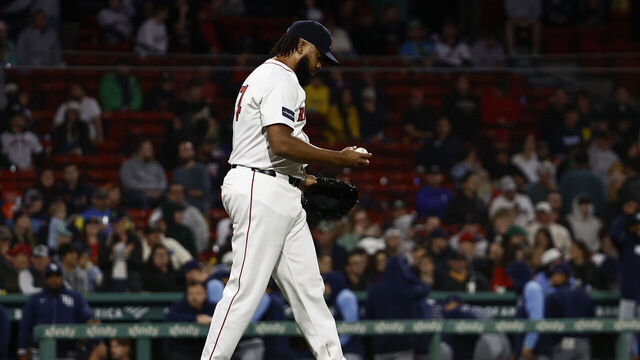 BOSTON, MA - MAY 16: Pitcher Kenley Jansen #74 of the Boston Red Sox walks back to the mound after giving up one of two runs against the Tampa Bay Rays in the ninth inning at Fenway Park on May 16, 2024 in Boston, Massachusetts.