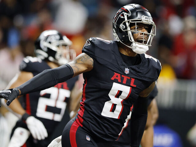 ATLANTA, GEORGIA - DECEMBER 10: Kyle Pitts #8 of the Atlanta Falcons reacts after scoring a touchdown during the first half of a against the Tampa Bay Buccaneers at Mercedes-Benz Stadium on December 10, 2023 in Atlanta, Georgia.