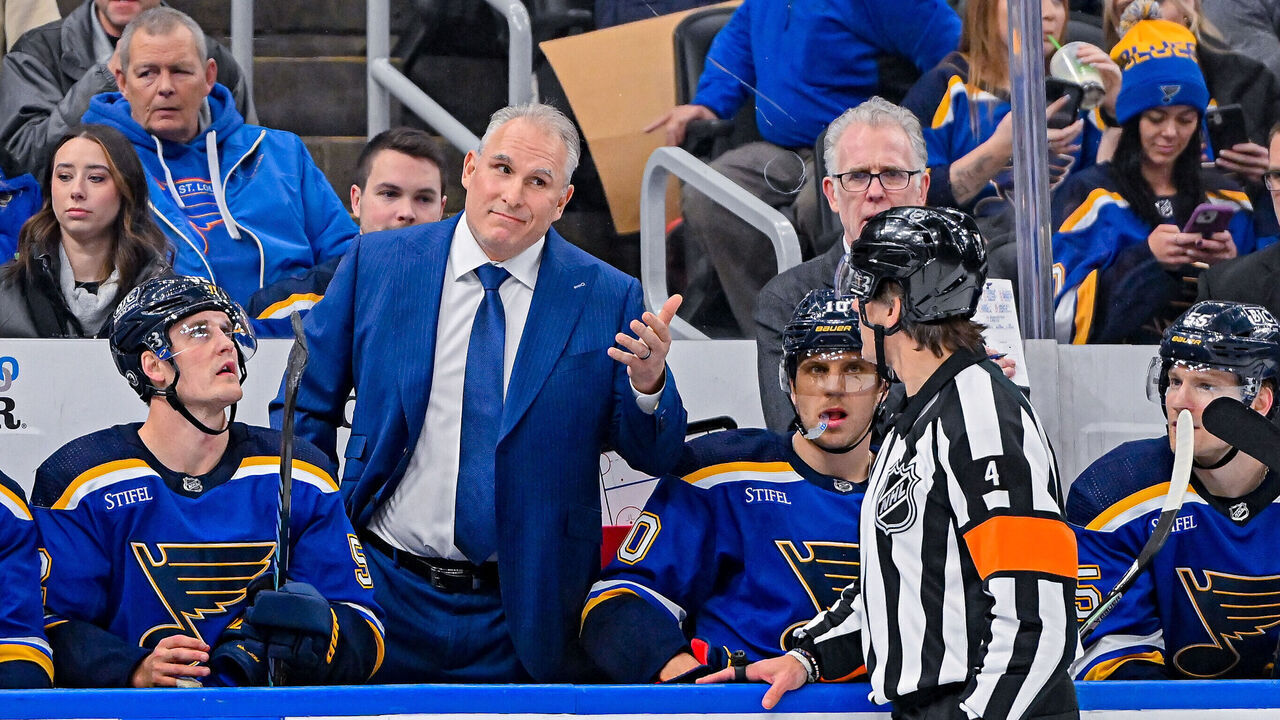 ST. LOUIS, MO - DECEMBER 27: St. Louis Blues Head Coach Craig Berube questions referee Wes McCauley (4) on his call during a game between the Toronto Maple Leafs and the St. Louis Blues on December 27, 2022, at the Enterprise Center in St. Louis MO