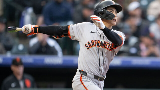 DENVER, COLORADO - MAY 08: Jung Hoo Lee #51 of the San Francisco Giants watches the flight of the ball during an at bat against the Colorado Rockies at Coors Field on May 8, 2024 in Denver Colorado.