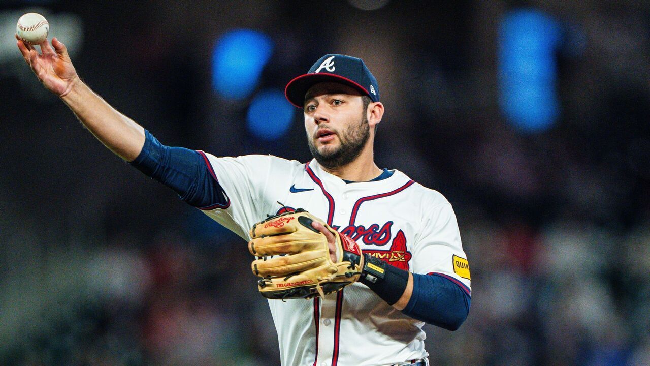 ATLANTA, GA - APRIL 23: David Fletcher #22 of Atlanta Braves makes a throw to first during the seventh inning against the Miami Marlins at Truist Park on April 23, 2024 in Atlanta, Georgia.