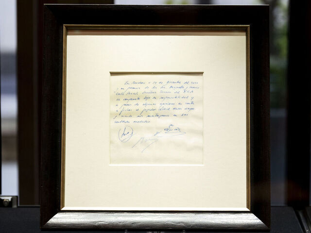 A napkin on which a written commitment was made to Lionel Messi, when he was 13-years-old, for a contract from FC Barcelona in December 2000, on display at Bonhams in London before it is offered at auction. Picture date: Wednesday May 8, 2024.