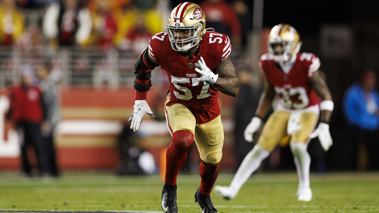 SANTA CLARA, CALIFORNIA - JANUARY 20: Dre Greenlaw #57 of the San Francisco 49ers defends in coverage during an NFC divisional round playoff football game against the Green Bay Packers at Levi's Stadium on January 20, 2024 in Santa Clara, California.
