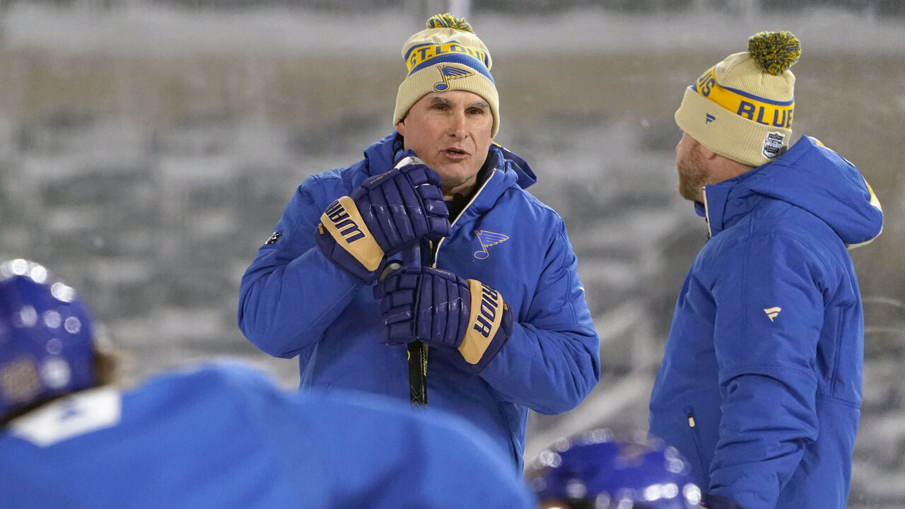 MINNEAPOLIS, MN - DECEMBER 31: St. Louis Blues head coach Craig Berube talks to his player during practice before the 2022 NHL Winter Classic between the St. Louis Blues and the Minnesota Wild on December 31, 2021 at Target Field in Minneapolis, Minnesota.