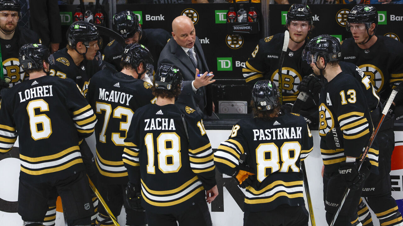 Boston, MA - May 12: Boston Bruins head coach Jim Montgomery talks to his during a time out in the third period.