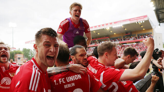 BERLIN, GERMANY - MAY 18: Janik Haberer of 1.FC Union Berlin (obscured) celebrates scoring his team's second goal with teammates during the Bundesliga match between 1. FC Union Berlin and Sport-Club Freiburg at An der Alten Foersterei on May 18, 2024 in Berlin, Germany.