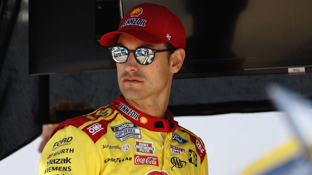 DARLINGTON, SC - MAY 11: Joey Logano (#22 Team Penske Shell Pennzoil Ford) watches the action on pit road during qualifying for the NASCAR Cup Series Goodyear 400 on May 11, 2024 at Darlington Raceway in Darlington, SC.