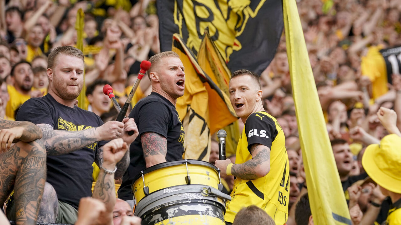 DORTMUND, GERMANY - MAY 18: Marco Reus of Borussia Dortmund celebrates his farewell with the fans after the Bundesliga match between Borussia Dortmund and SV Darmstadt 98 at Signal Iduna Park on May 18, 2024 in Dortmund, Germany.