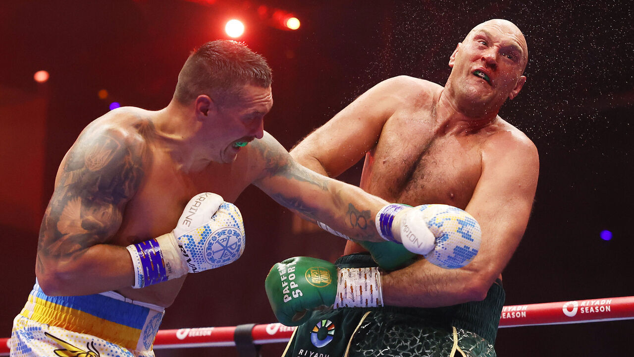 RIYADH, SAUDI ARABIA - MAY 18: Oleksandr Usyk punches Tyson Fury during the IBF, WBA, WBC, WBO and Undisputed Heavyweight titles' fight between Tyson Fury and Oleksandr Usyk at Kingdom Arena on May 18, 2024 in Riyadh, Saudi Arabia.