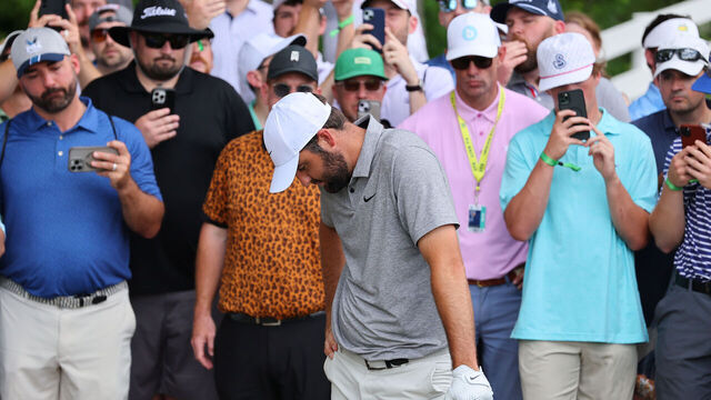 LOUISVILLE, KENTUCKY - MAY 18: Spectators look on as Scottie Scheffler of the United States prepares to take a drop on the fourth hole during the third round of the 2024 PGA Championship at Valhalla Golf Club on May 18, 2024 in Louisville, Kentucky.