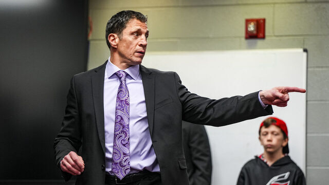 RALEIGH, NORTH CAROLINA - MARCH 21: Carolina Hurricanes head coach Rod Brind'Amour talks in the locker room after an NHL hockey game against the Philadelphia Flyers at PNC Arena on March 21, 2024 in Raleigh, North Carolina.