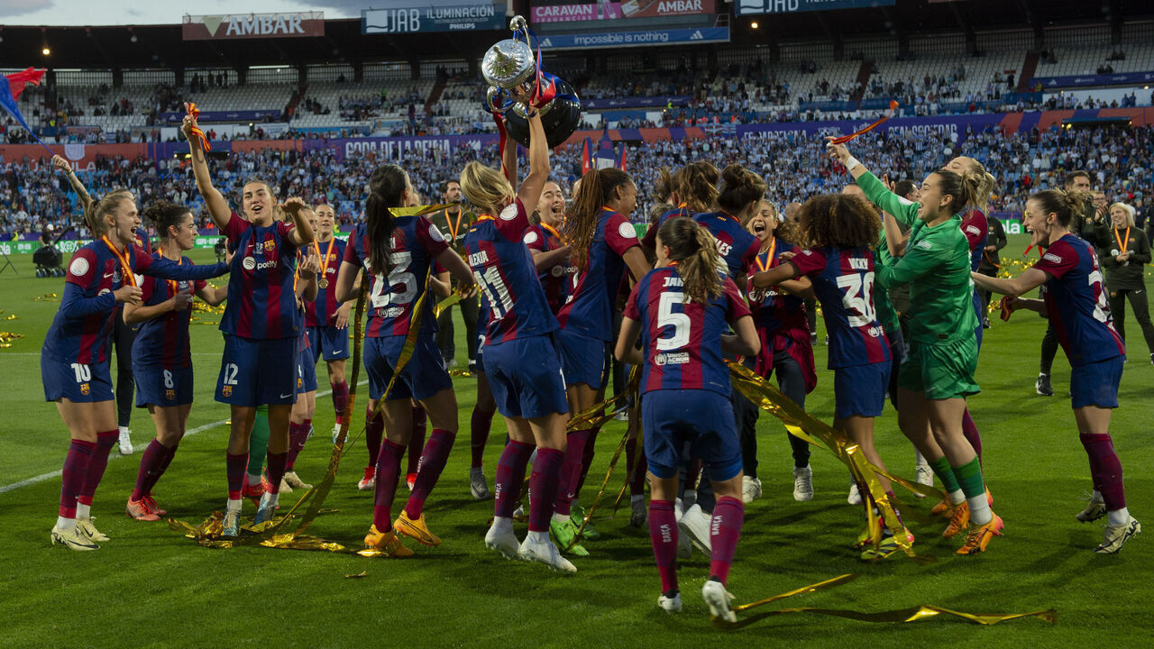 ZARAGOZA, SPAIN - MAY 18: Players of FC Barcelona celebrate with the trophy after winning the Copa de la Reina 2024 Final match between FC Barcelona and Real Sociedad at the Estadio Municipal de La Romareda on May 18, 2024 in Zaragoza, Spain.