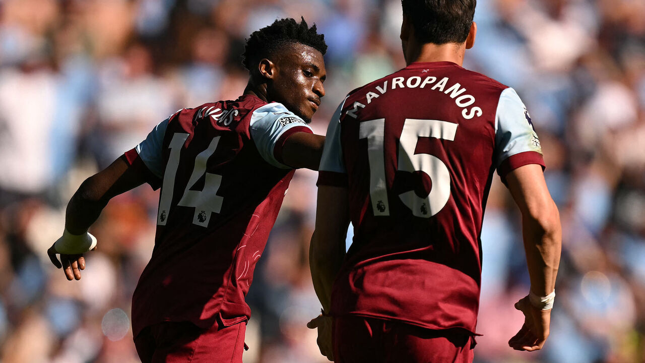 West Ham United's Ghanaian midfielder #14 Mohammed Kudus (L) celebrates scoring the team's first goal during the English Premier League football match between Manchester City and West Ham United at the Etihad Stadium in Manchester, north west England, on May 19, 2024.