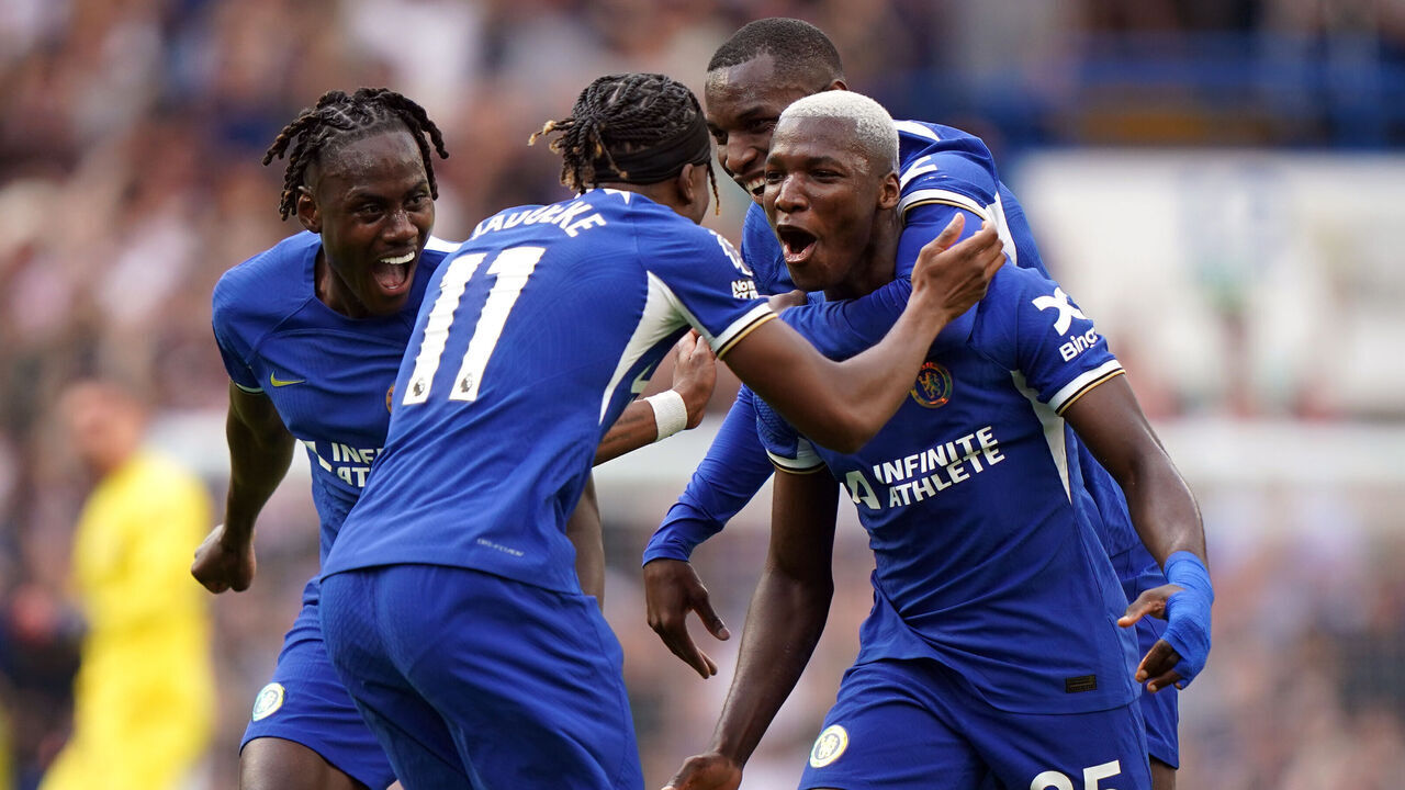 Chelsea's Moises Caicedo (right) celebrates scoring their side's first goal of the game from the half-way line with team-mates during the Premier League match at Stamford Bridge, London. Picture date: Sunday May 19, 2024.