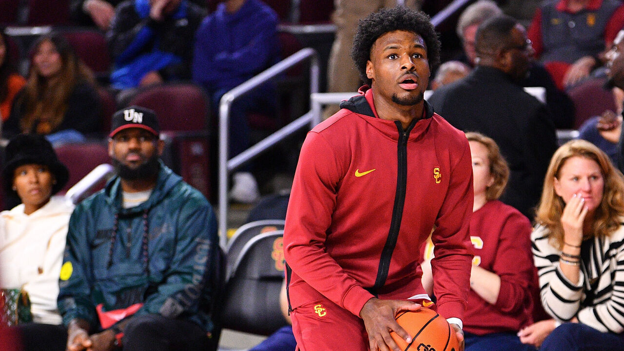 LOS ANGELES, CA - JANUARY 10: Lebron and Savannah James watch their son USC Trojans guard Bronny James (6) warm up before the college basketball game between the Washington State Cougars and the USC Trojans on January 10, 2024 at Galen Center in Los Angeles, CA.
