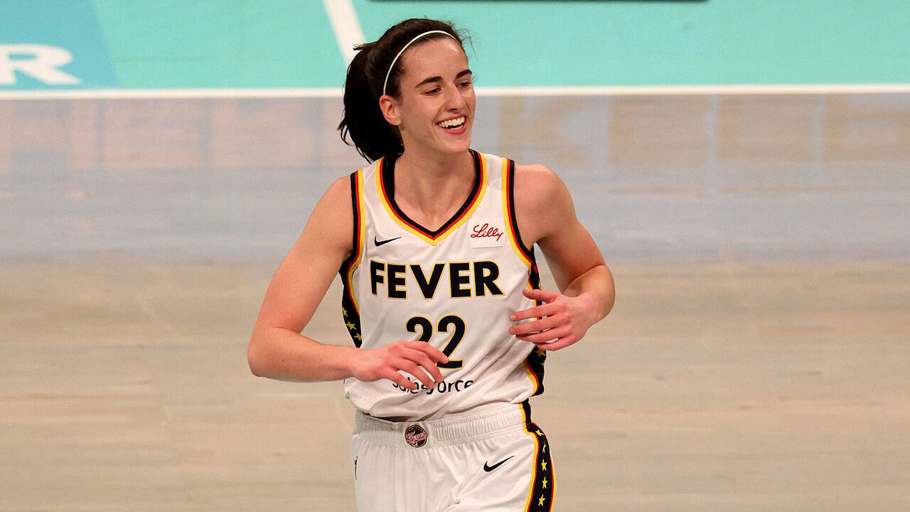 NEW YORK, NEW YORK - MAY 18: Caitlin Clark #22 of the Indiana Fever reacts during the first half against the New York Liberty at Barclays Center on May 18, 2024 in New York City.