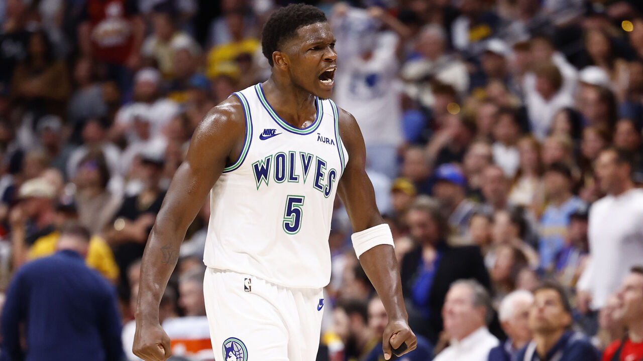 DENVER, COLORADO - MAY 19: Anthony Edwards #5 of the Minnesota Timberwolves celebrates a three point basket during the third quarter against the Denver Nuggets in Game Seven of the Western Conference Second Round Playoffs at Ball Arena on May 19, 2024 in Denver, Colorado.