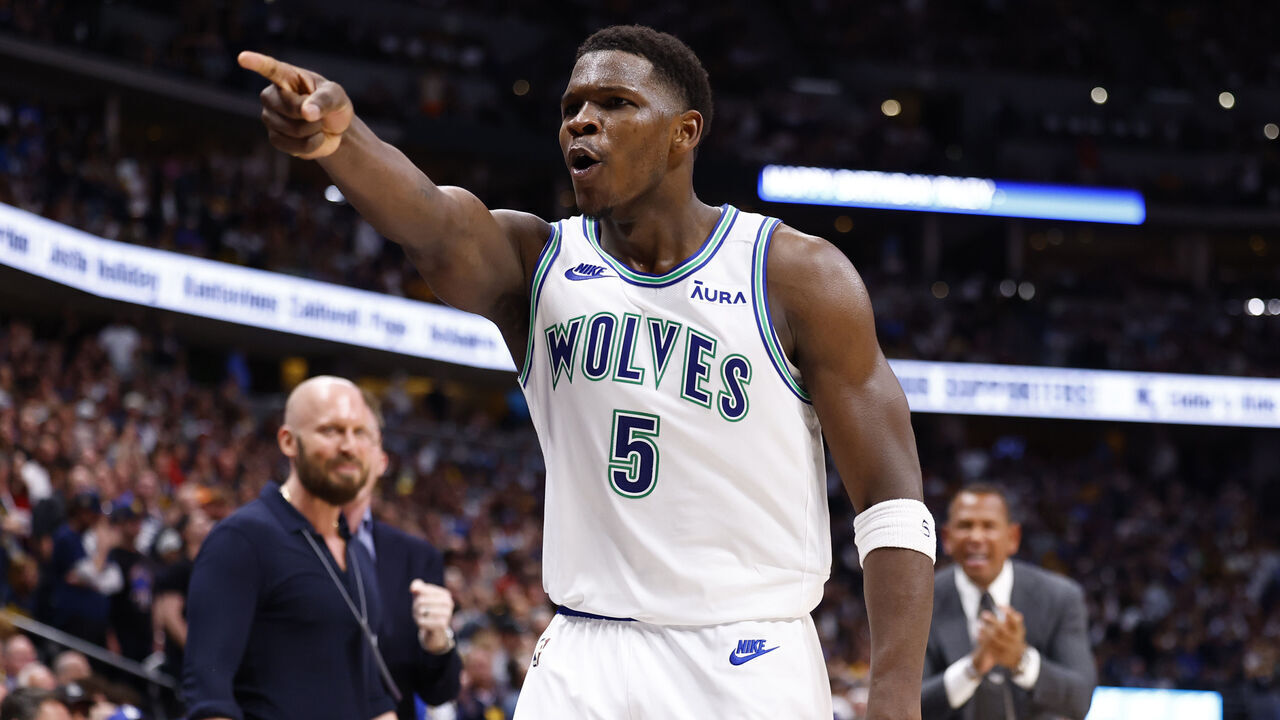 DENVER, COLORADO - MAY 19: Anthony Edwards #5 of the Minnesota Timberwolves reacts to a three point basket during the fourth quarter against the Denver Nuggets in Game Seven of the Western Conference Second Round Playoffs at Ball Arena on May 19, 2024 in Denver, Colorado.