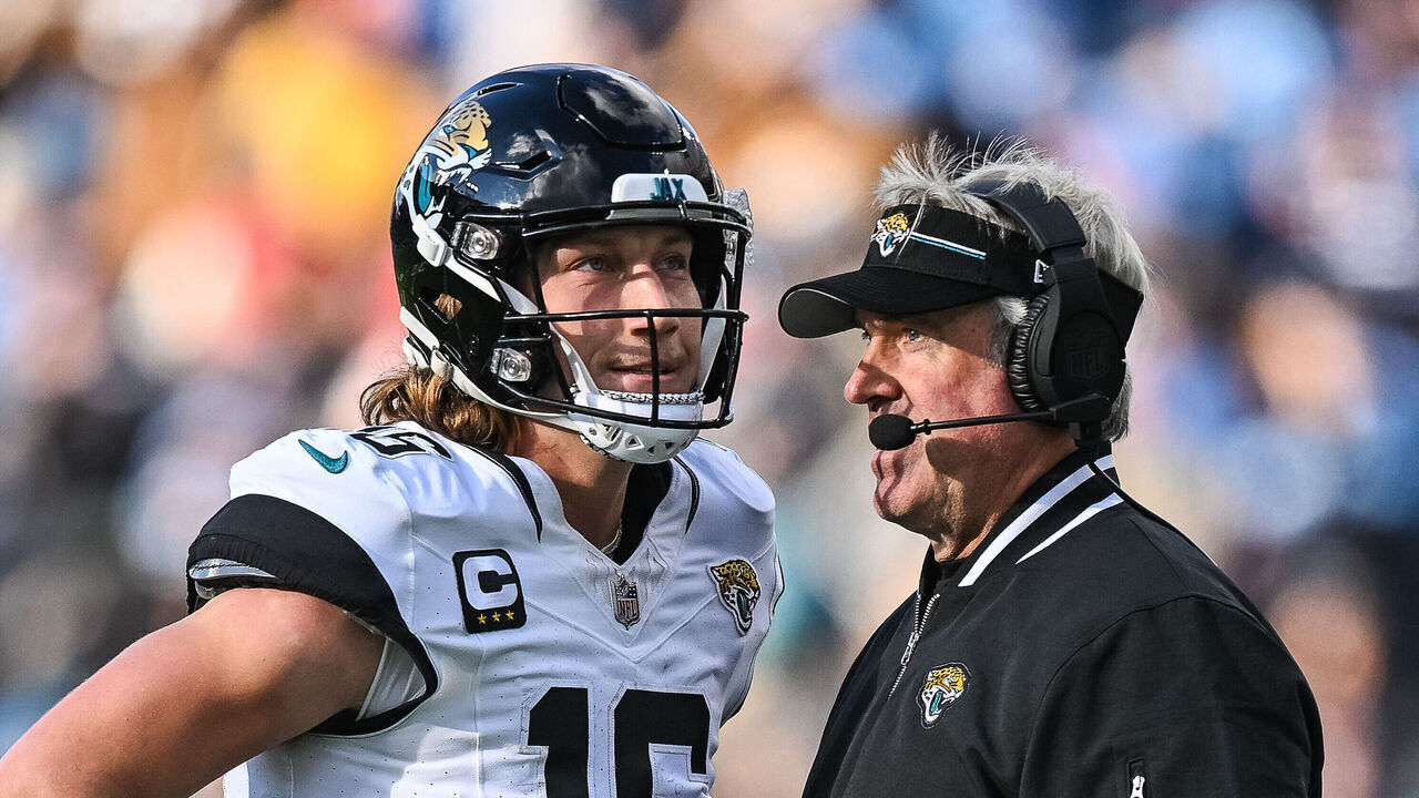 NASHVILLE, TN - JANUARY 07: Jacksonville Jaguars quarterback Trevor Lawrence (16) talks to Jacksonville Jaguars head coach Doug Pederson during the NFL game between the Tennessee Titans and the Jacksonville Jaguars on January 7, 2024, at Nissan Stadium in Nashville, TN.