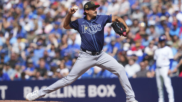 TORONTO, ON - MAY 18: Zach Eflin #24 of the Tampa Bay Rays pitches to the Toronto Blue Jays during the first inning in their MLB game at the Rogers Centre on May 18, 2024 in Toronto, Ontario, Canada.