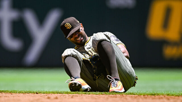 ATLANTA, GA MAY 20: San Diego second baseman Xander Bogaerts (2) goes down in pain during the first game of a MLB doubleheader between the San Diego Padres and the Atlanta Braves on May 20th, 2024 at Truist Park in Atlanta, GA.
