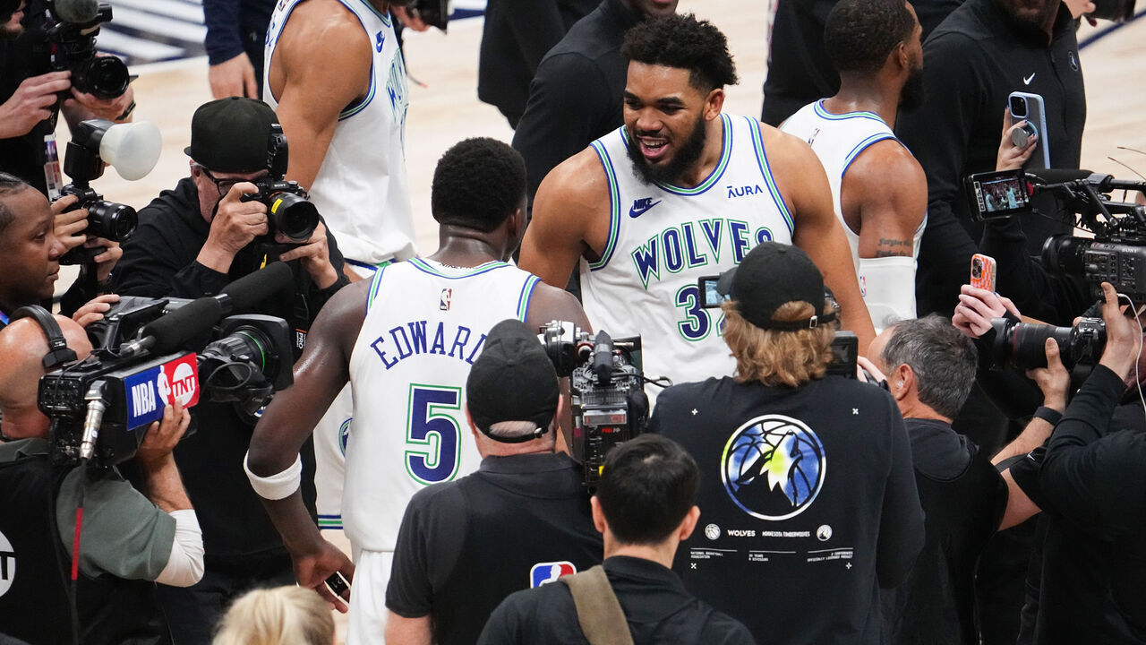 DENVER, CO - MAY 19: Anthony Edwards #5 embraces Karl-Anthony Towns #32 of the Minnesota Timberwolves celebrates after the game against the Denver Nuggets during Round 2 Game 7 of the 2024 NBA Playoffs on May 19, 2024 at the Ball Arena in Denver, Colorado. NOTE TO USER: User expressly acknowledges and agrees that, by downloading and/or using this Photograph, user is consenting to the terms and conditions of the Getty Images License Agreement. Mandatory Copyright Notice: Copyright 2023 NBAE