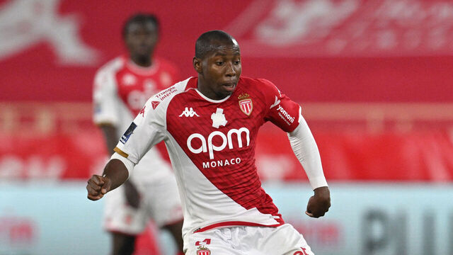 Monaco's Malian midfielder #04 Mohamed Camara (L) passes the ball during the French L1 football match between AS Monaco and FC Nantes at the Louis II Stadium (Stade Louis II) in the Principality of Monaco on May 19, 2024.
