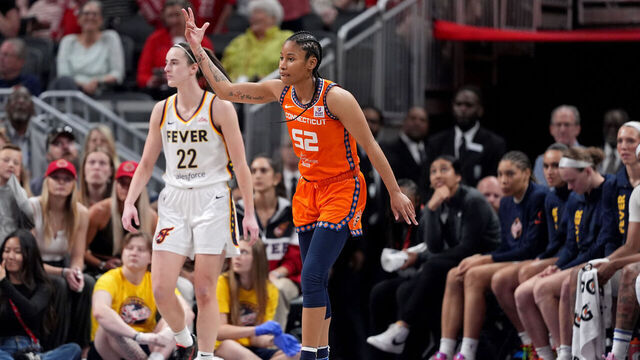 INDIANAPOLIS, INDIANA - MAY 20: Tyasha Harris #52 of the Connecticut Sun celebrates during the fourth quarter in the game at Gainbridge Fieldhouse on May 20, 2024 in Indianapolis, Indiana.