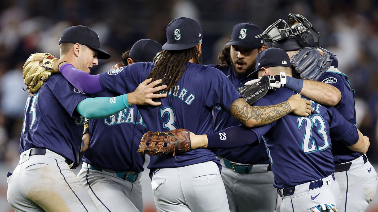 NEW YORK, NEW YORK - MAY 20: The Seattle Mariners celebrate their win after the ninth inning against the New York Yankees at Yankee Stadium on May 20, 2024 in the Bronx borough of New York City. The Mariners won 5-4.