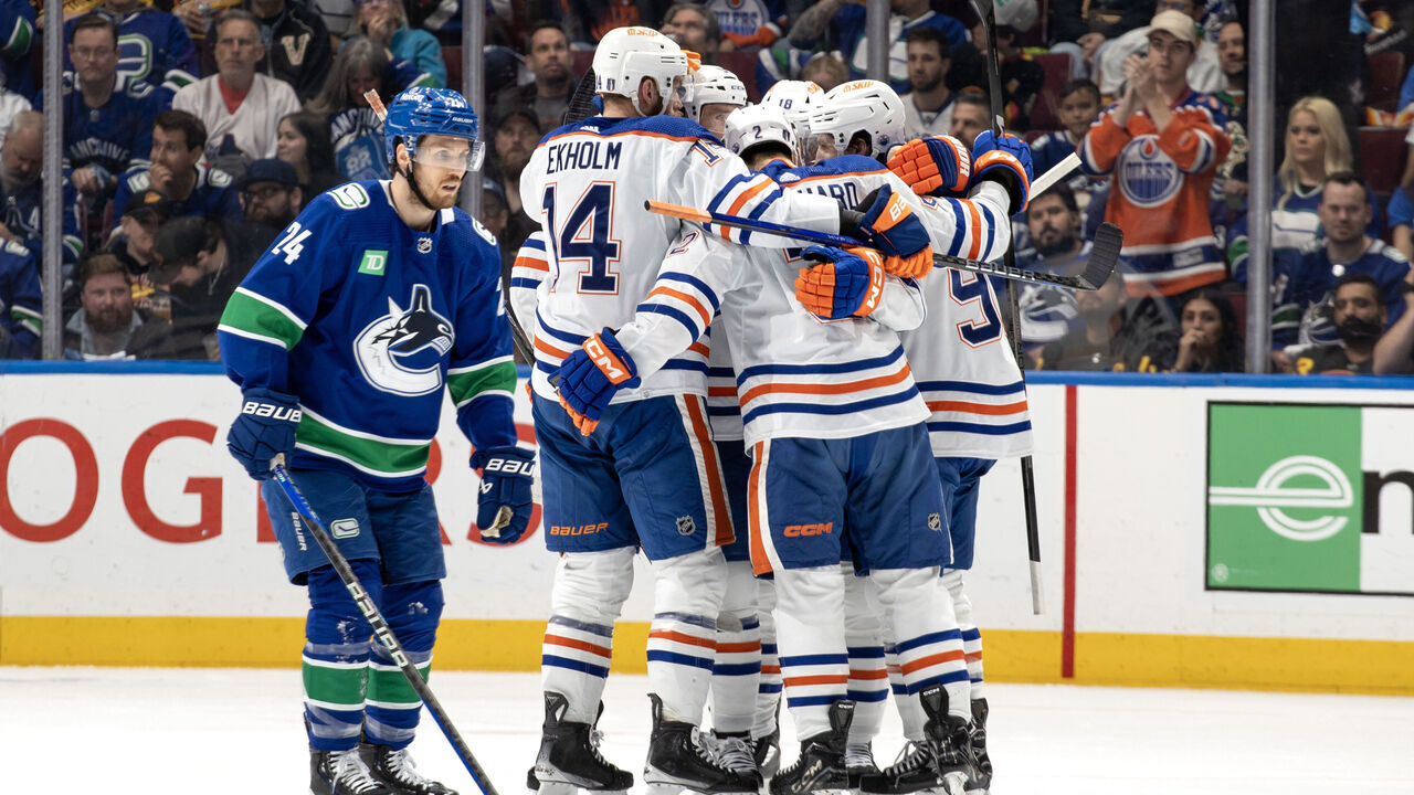 VANCOUVER, CANADA - MAY 20: Evan Bouchard #2 of the Edmonton Oilers celebrates his goal with teammates during the second period in Game Seven of the Second Round of the 2024 Stanley Cup Playoffs against the Vancouver Canucks at Rogers Arena on May 20, 2024 in Vancouver, British Columbia, Canada.